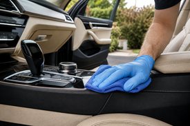 Microfiber detailing of a car console and leather interior